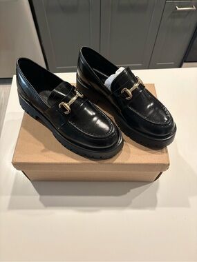 Steve Madden Black Patent Leather Lug Sole Loafers with Gold Bit